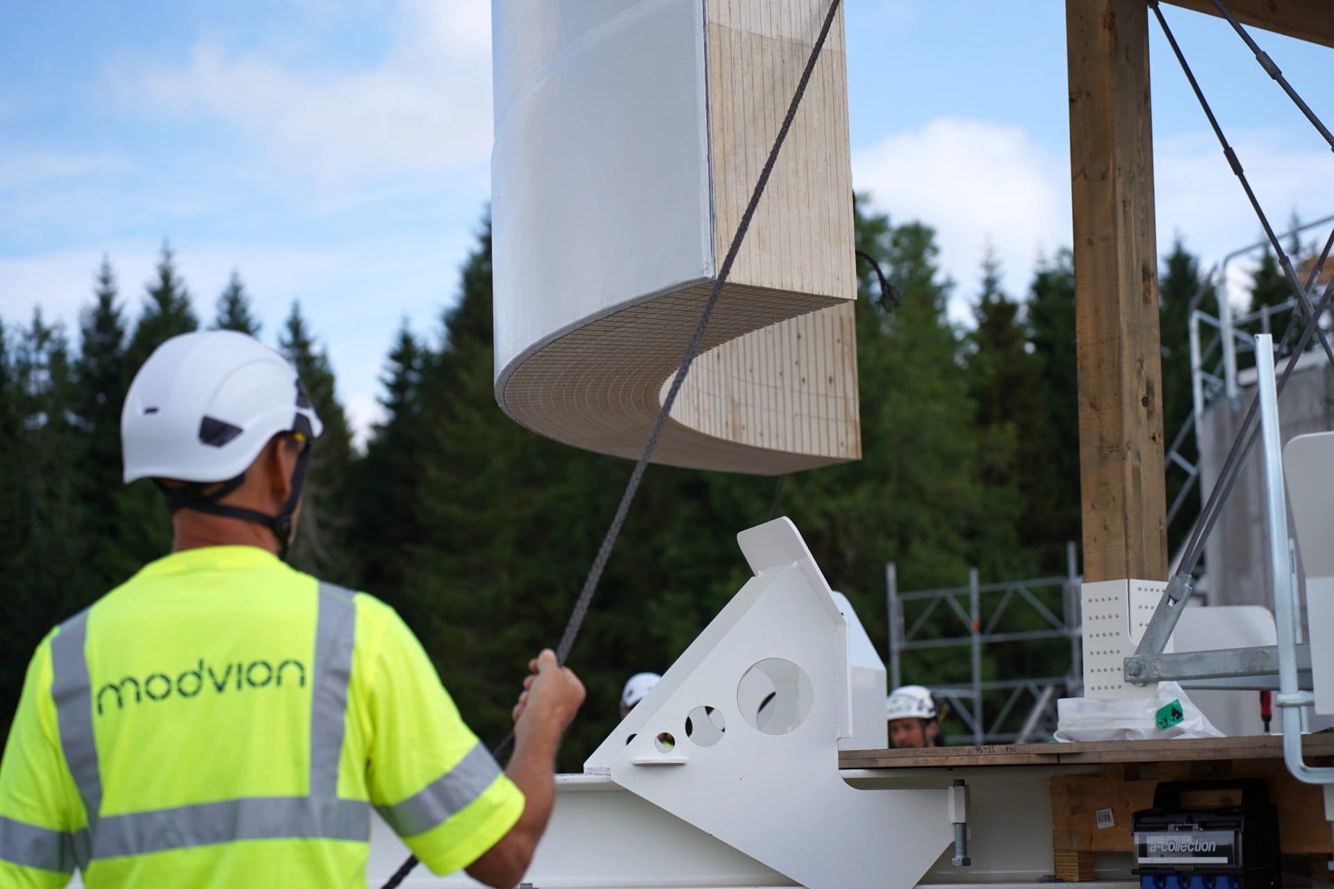 section of a wooden wind turbine tower being assembled in Sweden