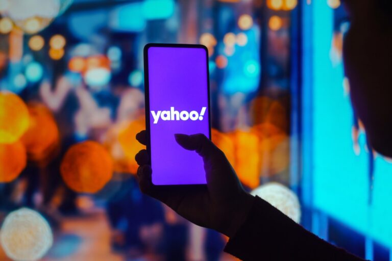 In this photo illustration, the Yahoo! logo is displayed on